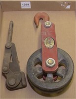 Buske cable pulley and a cable puller