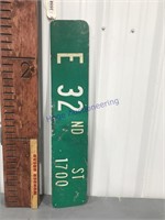 E 32ND ST two-sided metal sign, 30 x 6"