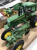 Pair of John Deere toy tractors