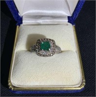 14CT WHITE GOLD EMERALD AND DIAMOND RING