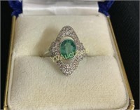 18CT WHITE GOLD EMERALD AND DIAMOND RING