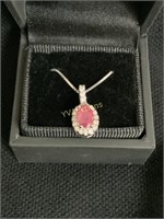 9CT WHITE GOLD RUBY AND DIAMOND PENDANT ON