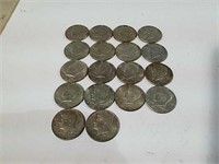 18 Kennedy half dollars dated 1966 and 67