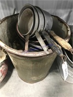 Metal waste can, old pans