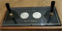 1881 Morgan silver dollar coins in desk set