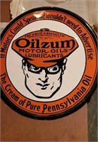 Oilzum Motor Oils metal sign, 12 inch diameter,