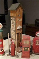 Metal, plaster, wood gas pump display items,