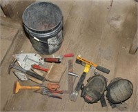 bucket lot of tools to include knee pads, mud