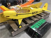 Yellow radio-controlled model airplane, needs