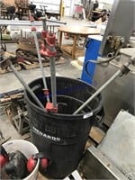 Plastic trash can, pipe clamps