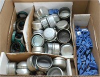 box of covered trailer bearing covers, EZ clips