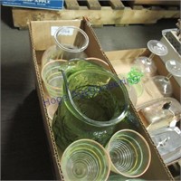Green glass pitchers, glasses