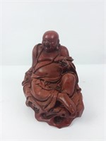Statuette en composite figurant Bouddha