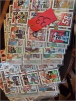 several pages of foot ball cards