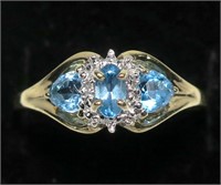 10K Yellow gold oval and triangular cut blue topaz
