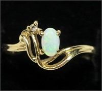 10K Yellow gold oval cabochon opal ring in swirl