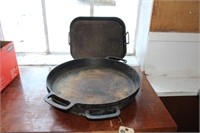 Pair of 17" cast iron griddles and roasting pan