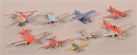 Nine Various Metal Toy Airplanes.