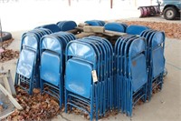 Metal Folding Chairs and racks of basketballs