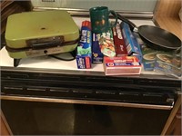 waffle iron, teflon pan, kitchen supplies