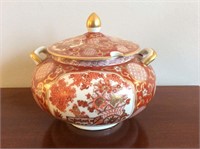 Oriental tureen with lid, red over white design