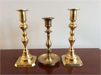 3 brass candlesticks, 9 inches tall.