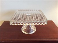 Clear glass cake stand, American pattern 11 in.²
