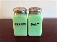 Salt and pepper green Hoosier style shakers.