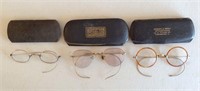 Three pairs of eyeglasses. One in Hodgson &