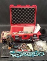 Red invicta case with jewelry, car meter, ect