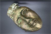 Bronze carving of face by Jong Ja Jenkins 8" H