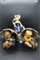 Three Goebel/Hummel figurines: Hummel Umbrella Gir