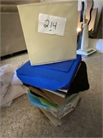 L214- STACK OF MISC CUBBY TOTES