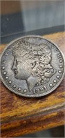 1891 silver Morgan one dollar coin