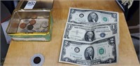 Indian penny,  2 dollar bills, 1 dollar silver