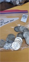 21 silver Kennedy half dollars
