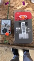 Analog Multimeter and Chainsaw Blade
