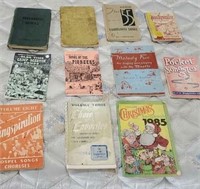 11 assorted vintage song books