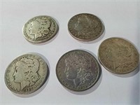 5 Morgan silver dollars 1881, 1883, 1879, 1881