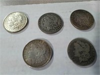 5 Morgan silver dollars 1885, 1887, 1888, 1889