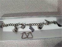 Charm bracelets with charms most marked Sterling