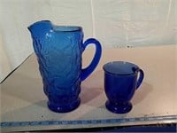 Blue Glass pitcher and mug.