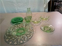 Started patterns of green depression glass pieces