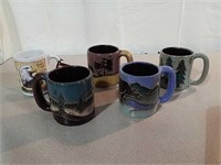 Four ceramic mugs all signed Mexico and American