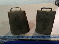 Two vintage small cowbells