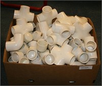 BOX OF PVC PIPE T'S AND ELBOWS