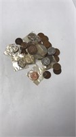 Lot of misc US and foreign money coins - many