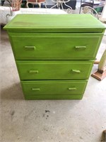 Green chest of drawers approximately 28 in tall