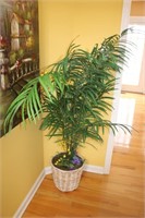 Large artificial plant with basket
