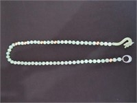 An Asian Jade Necklace With Dragon Clasp